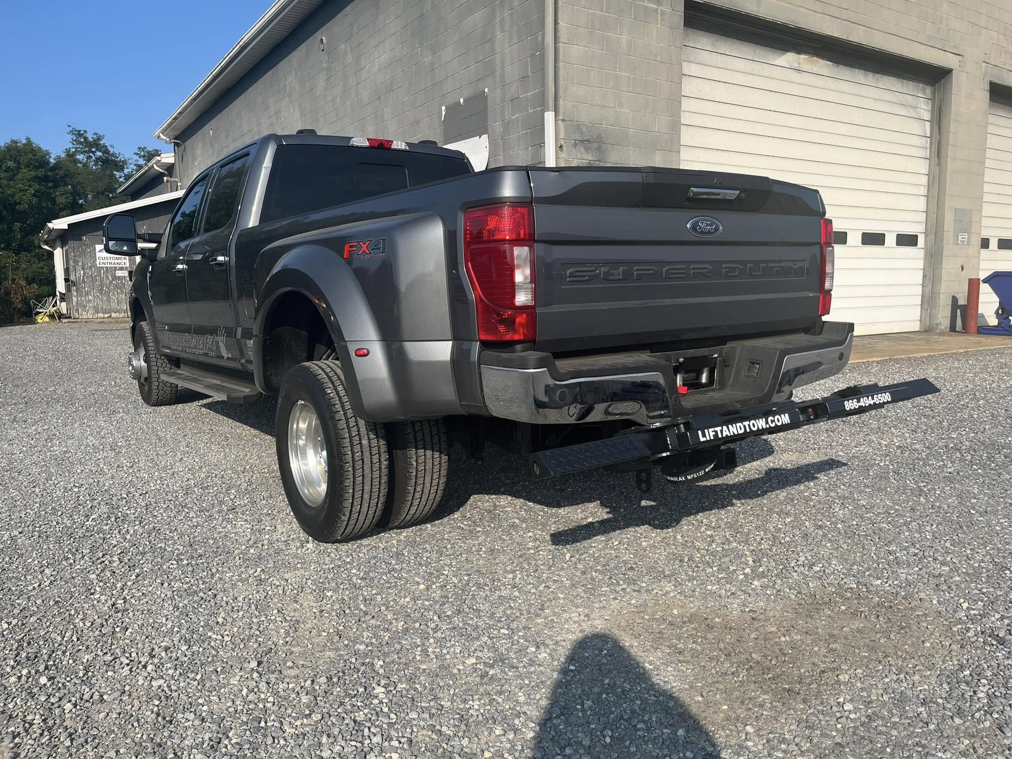 ford-super-duty-truck-with-lift-and-tow-system