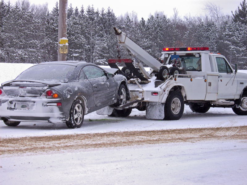 tow truck towing a vehicle
