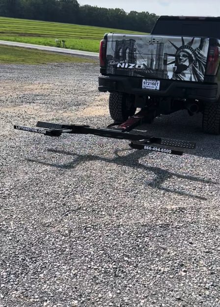 truck-with-empty-lift-and-tow-dolly-system